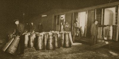 Unloading a milk train by English Photographer
